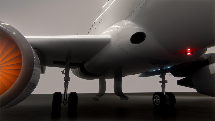 Dolly out reveal of a generic white passenger airplane parked inside a clean, modern hangar with glowing engines.