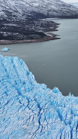 Perito Moreno Glacier At El Calafate In Santa Cruz Argentina. Stunning Landscape. Los Glaciares National Park. Iceberg Background. Perito Moreno Glacier At El Calafate In Santa Cruz Argentina.