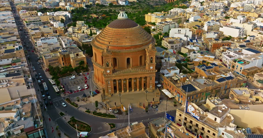 Aerial view of Mosta Church, famous remarkable wartime miracle, architectural landmarks, Malta 