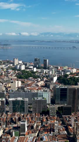 Rio de Janeiro Brazil. Panning wide view of downtown city of Rio de Janeiro Brazil. Tourism landmark. Office building exterior and harbor zone near Guanabara bay.