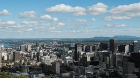 A modern cityscape with mountains and water in the background. Global networking and business technology concept. - Powered by Shutterstock - Get 15% off with code: PIKWIZARD15