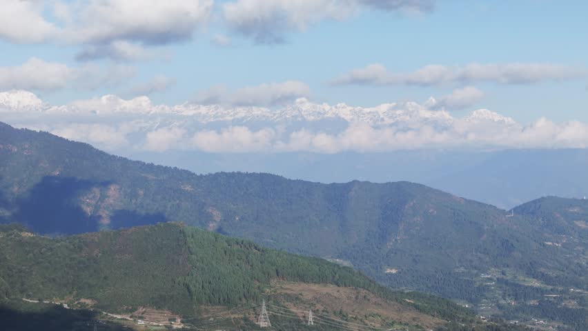 A breathtaking mountain view from Kalinchowk, Dolakha reveals sweeping Himalayan landscapes. Rolling hills, distant peaks, and open skies create a serene natural scene reflecting Nepal’s beauty.