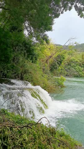Powerful waterfalls of Krka National Park in Croatia surrounded by lush greenery. Scenic freshwater cascades showcasing pure nature, eco tourism and famous travel destination.