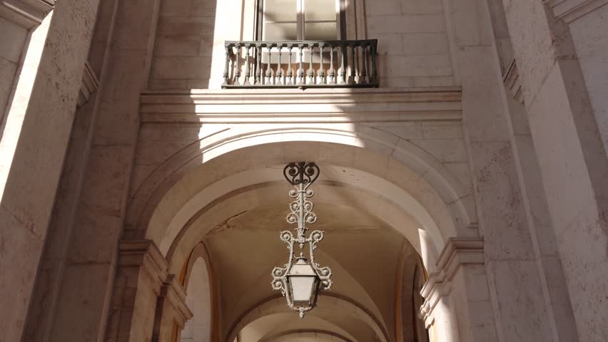 Low Angle View of Ornate Arco da Rua Augusta Ceiling Architecture Featuring Intricate Marble Masonry  in Lisbon City, Portugal