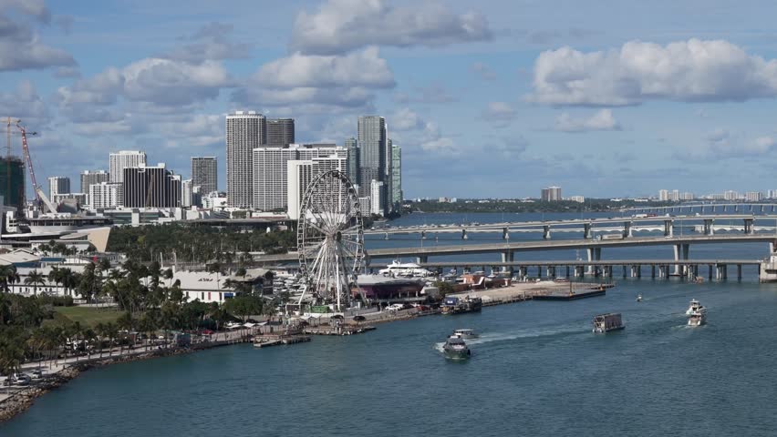 Aerial view of the coast in the daytime and a view of the city of Miami, Florida, United States