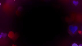 Floating colorful glowing hearts forming a circular frame on a black background, romantic bokeh light animation for wedding titles. - Powered by Shutterstock - Get 15% off with code: PIKWIZARD15