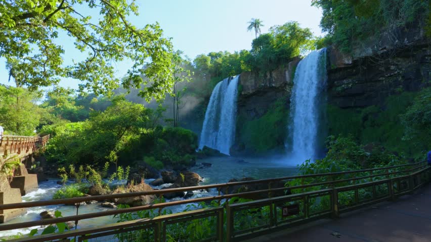 Tourists Over Trails And Boardwalks Within Iguazú National Park On The Border Of Argentina And Brazil. Static Shot
