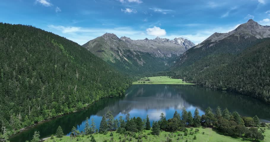 Aerial view of beautiful high altitude forest lake mountain landscape