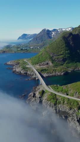 Majestic aerial view of the stunning Lofoten archipelago in Norway on a beautiful sunny summer day. Reine