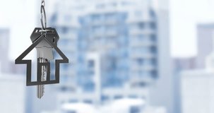 Animation of hanging silver house keys against blurred view of tall buildings with copy space. Relocation and real estate concept - Powered by Shutterstock - Get 15% off with code: PIKWIZARD15