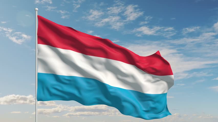 Luxembourg Flag Flying Against Clear Sky