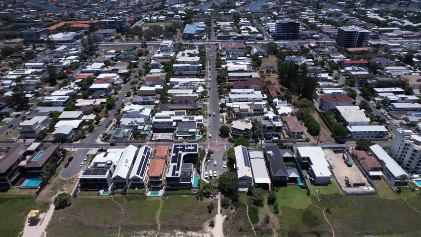 Suburbs And Mermaid Beach In Queensland, Australia - Aerial Pullback