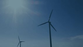 Animation of financial data processing over wind turbine. Global sustainability, wind energy, business, finances, computing and data processing concept digitally generated video. - Powered by Shutterstock - Get 15% off with code: PIKWIZARD15
