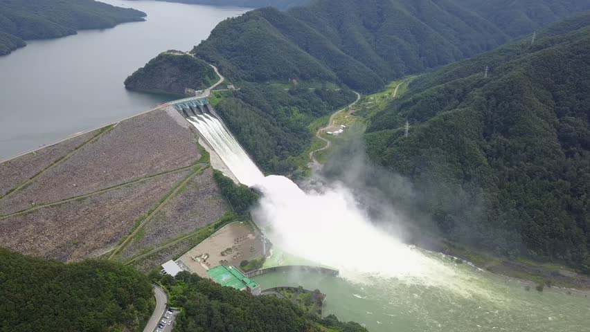 An incredible 4K drone shot capturing a rare spectacle: the massive water discharge from Soyanggang Dam in Chuncheon, South Korea. This event, which occurs approximately every five years, shows the im