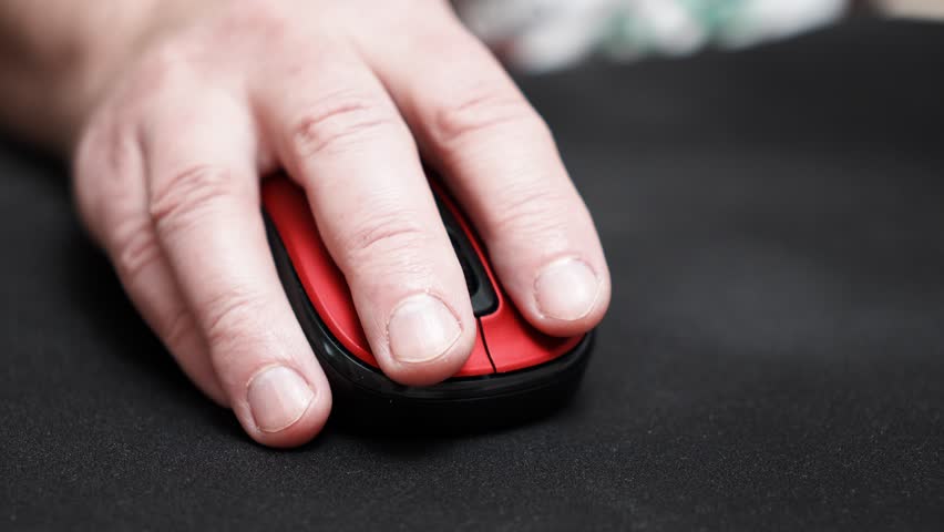hand holding a computer mouse