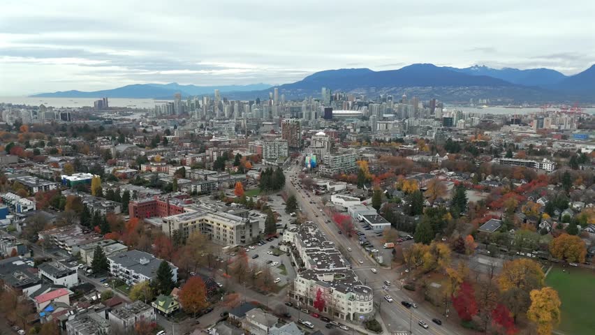 Mount Pleasant Neighborhood Overlooking The Downtown Skyline Of Vancouver, British Columbia, Canada. Aerial Drone Shot