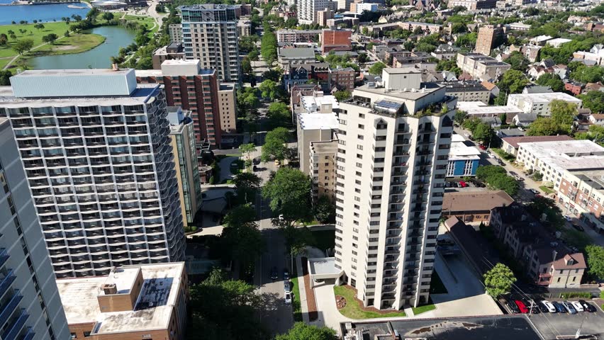 Aerial of Downtown Milwaukee Wisconsin on Labor Day Weekend.  Birdseye view of apartments and high rises on the east side of town.