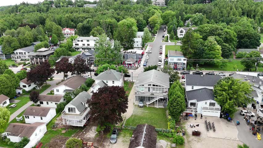 Aerial of Fish Creek in Door County Wisconsin on an overcast day.  Nosedive drone shot approaching Main Street of town.