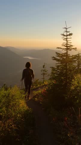 Hiker Enjoying Golden Sunset Over Scenic Chilliwack Mountains, British Columbia