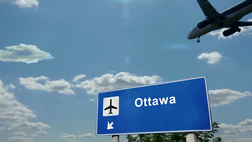 Ottawa Canada Jet plane landing. City arrival with airport direction sign. Travel, business, tourism and airplane transport concept.