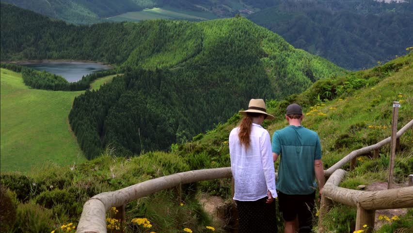 Couple Hiking on Trail at Boca do Inferno Viewpoint, Sete Cidades, Azore