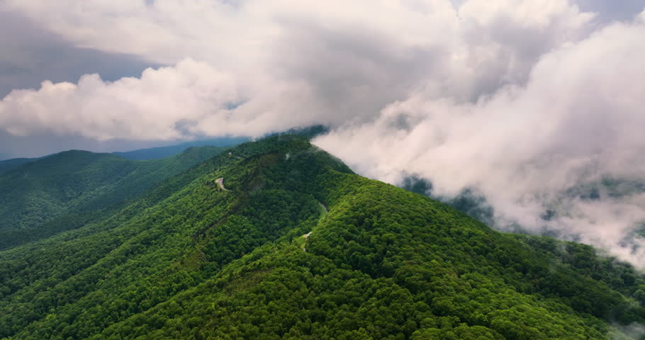 Scenic drive on Blue Ridge Parkway in summer season. Mountain pass road in North Carolina Appalachian mountains, USA.