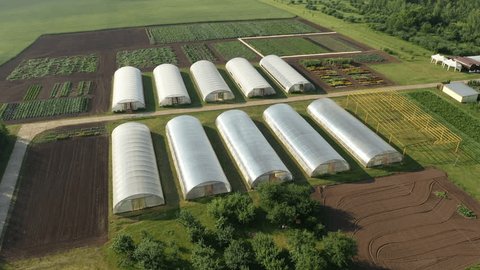 High Altitude Orbit over Greenhouses Gardens