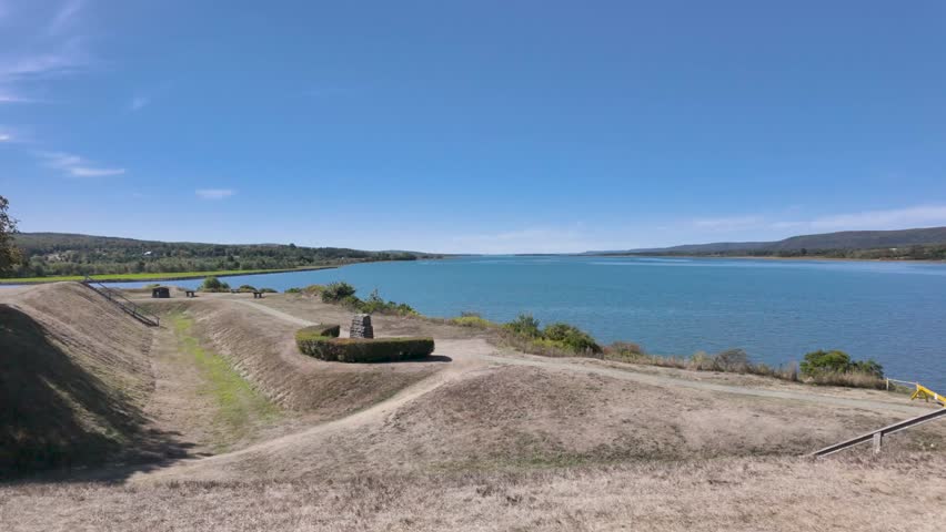 Slow motion footage of Fort Anne National Historic Site in Annapolis Royal Nova Scotia Canada featuring historic earthwork defences preserved military buildings and scenic landscapes on a sunny day