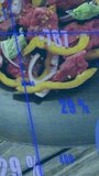 Vertical video: Handheld sweep moving right and down, overlays shifting to reveal food analytics. Pan, kebab, pepper, onion, garnish, infographic, vertical video - Powered by Shutterstock - Get 15% off with code: PIKWIZARD15