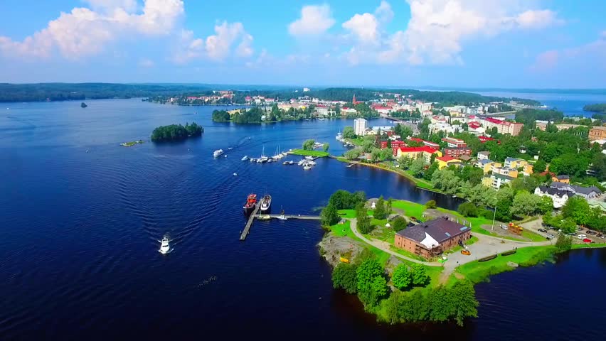 Aerial view of Olavinlinna Medieval Castle in Savonlinna, Finland. Beautiful summer landscape with blue lakes and clear sky
