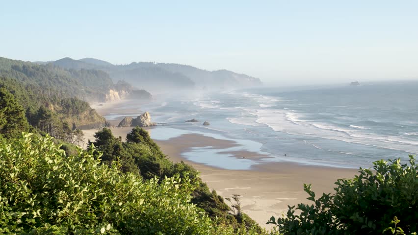 Wide shot of Arcadia Beach, Oregon at sunset.