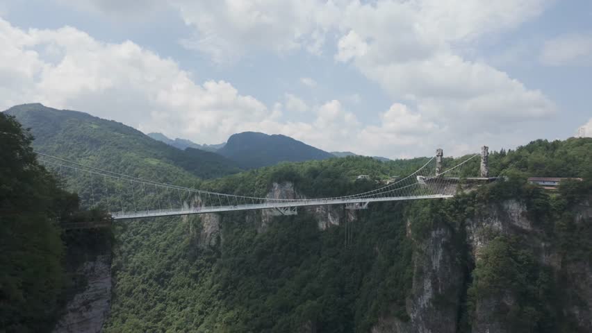 Side view of Glass Bridge over Grand Canyon in Zhangjiajie National Forest Park, China