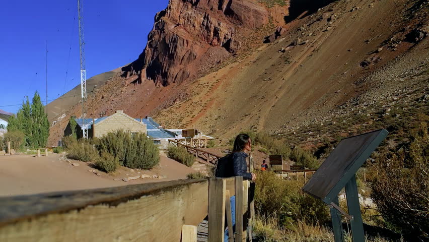 Tourist Woman Reading Information Board In Puente Del Inca, Mendoza, Argentina - 4K