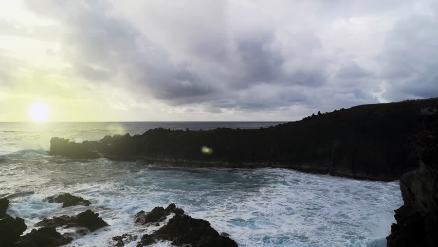 Dramatic Sea Waves and Volcanic Cliffs at Sunset, Easter Island, Chile - 4K