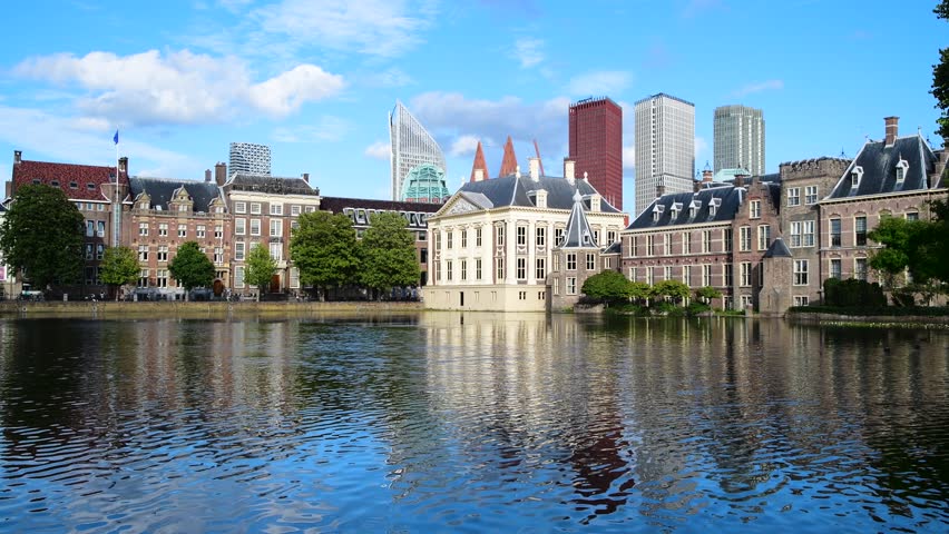 Reflection of The Hague skyline and Dutch Binnenhof parliament building, Netherlands
