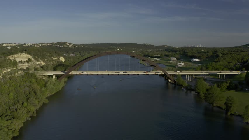 Aerial drone footage of the Pennybacker Bridge (360 Bridge) spanning Lake Austin in Austin, Texas, filmed circa 2020