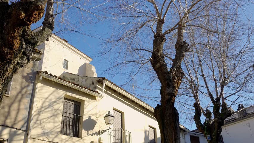 Streets with old buildings in the beautiful town of Chinchon on a sunny day, Madrid.