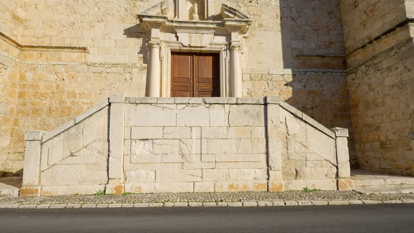 Main facade of the church of the Assumption in the town of Chinchon, Madrid.