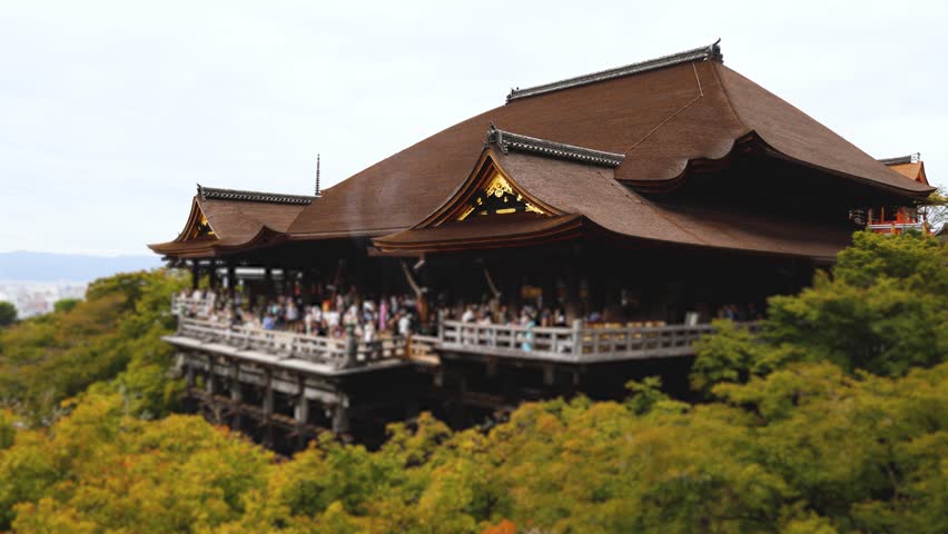 Kiyomizu-dera buddhist temple in Kyoto prefecture, Japan, Higashiyama ward, autumn fall view with mountains, Kyoto streets and skyline, shrine and pagoda, travel to Japan, Kansai region