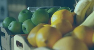 Cam zooming and panning causing HUD shifting as green orange fruit moving mid charts showing stock. Citrus, tray, retail, display, overlay, analytics, motion - Powered by Shutterstock - Get 15% off with code: PIKWIZARD15