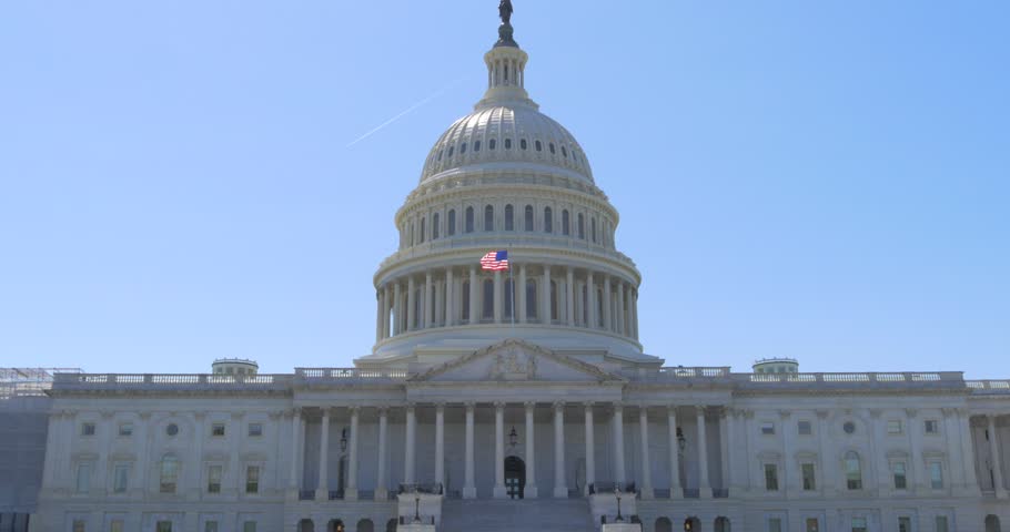 Aerial or street view of Washington, D.C., showcasing iconic landmarks, government buildings, and urban streets, capturing the capital’s political and historic significance.