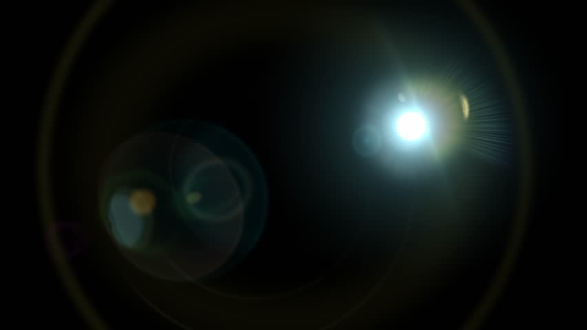 Canon Sumire 85mm prime lens flare moving right to left. Organic and soft optical effect isolated on black for easy compositing and screen blending