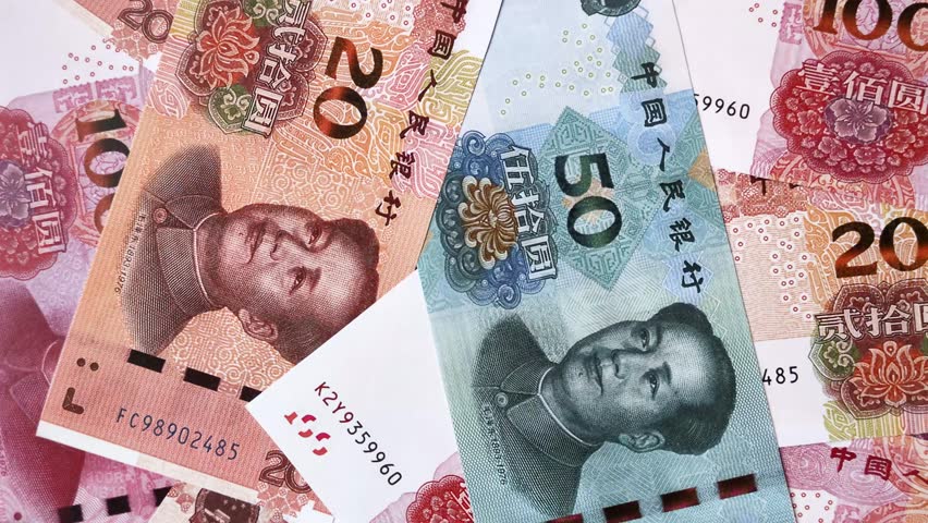 Chinese paper money, yuans in various denominations. China money as a business background for your design