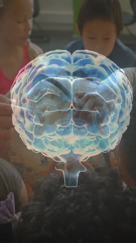 Vertical video: Class watching for study, child tapping tablet starting rotating 3D brain hologram. Neuroscience, visualization, classroom, students, projection, translucent, vertical video