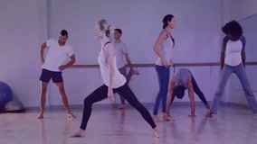 instructor woman stepping into lunge guiding barre class matching stances with overlay bar graphs. Fitness, wellness, stretching, empowerment, healthy lifestyle, movement, interior - Powered by Shutterstock - Get 15% off with code: PIKWIZARD15