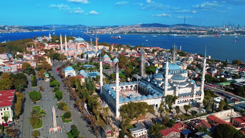 Stunning Istanbul: Blue Mosque and Hagia Sophia over Bosphorus and golden horn aerial view