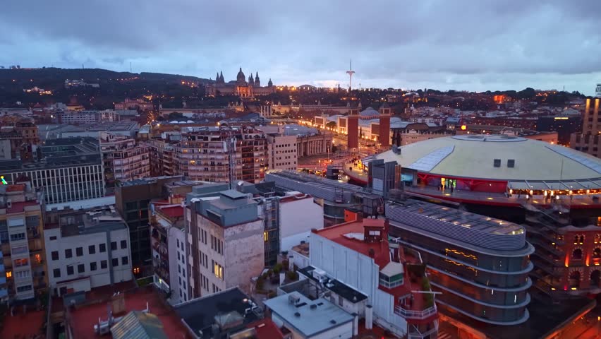 Drone shot overlooking traffic circle at Plaça d