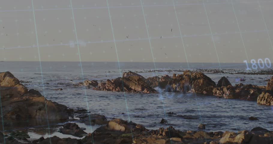 Animated jagged coastal rocks rising from pools, overlaying 3D grid and circling seabirds. Seascape, rugged terrain, digital interface, nature, landscape, environment, tranquility