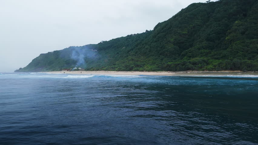 Ocean view of coastal landscape with height cliffs, beach coastline