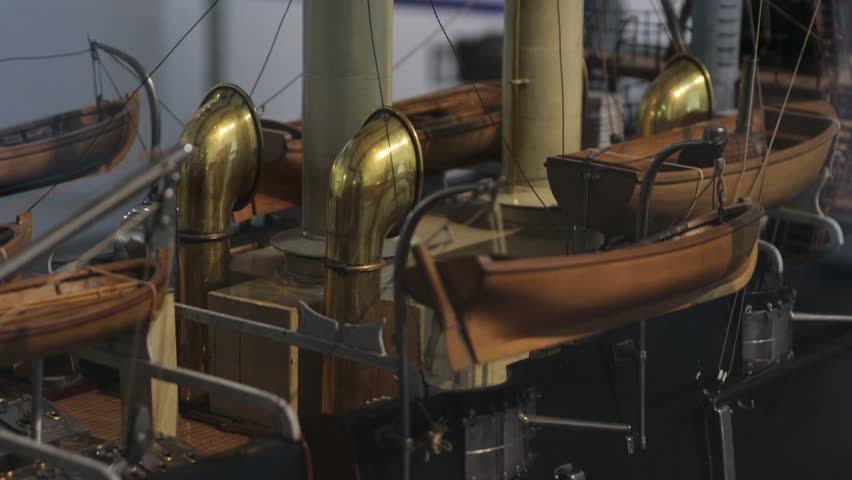 A historic boat on exhibit at a museum.